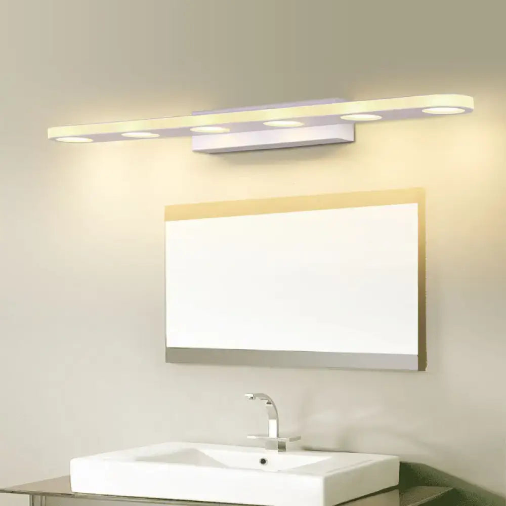 Silver oblong LED vanity light with five LEDs, wall-mounted over bathroom mirror Decorbites on Tampa Home & Garden Store