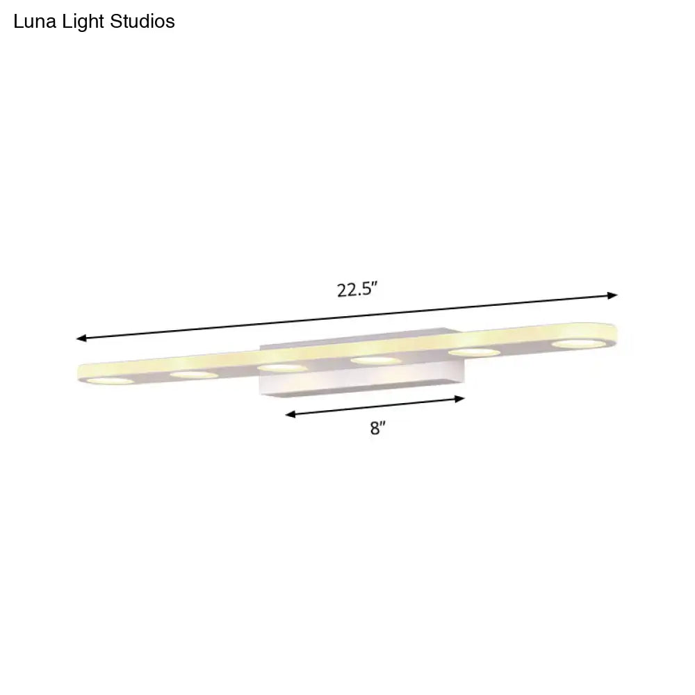 Silver oblong LED wall light by Decorbites with six circular modules, 22.5in long on Tampa Home & Garden Store