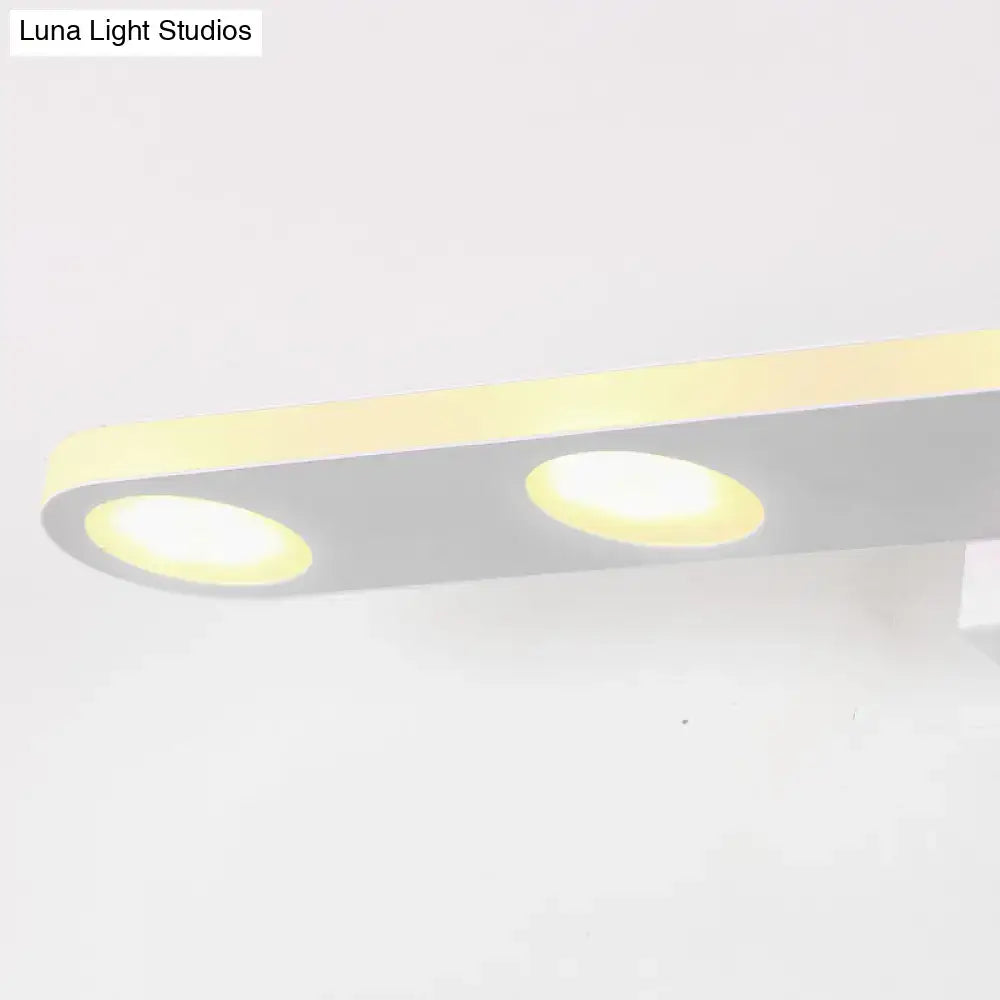 Silver oblong LED wall light with dual round modules, warm white glow, Decorbites on Tampa Home & Garden Store