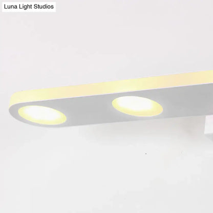 Silver oblong LED wall light with dual round modules, warm white glow, Decorbites on Tampa Home & Garden Store