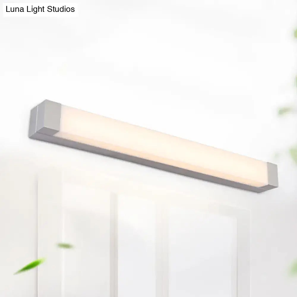 Silver rectangular vanity sconce in silver metal with diffused white shade by Decorbites on Tampa Home & Garden Store