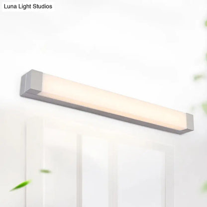 Silver rectangular vanity sconce in silver metal with diffused white shade by Decorbites on Tampa Home & Garden Store