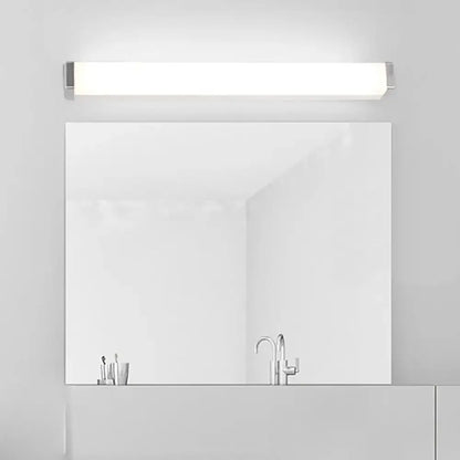 Silver rectangular LED light fixture by Decorbites over bathroom mirror on Tampa Home & Garden Store