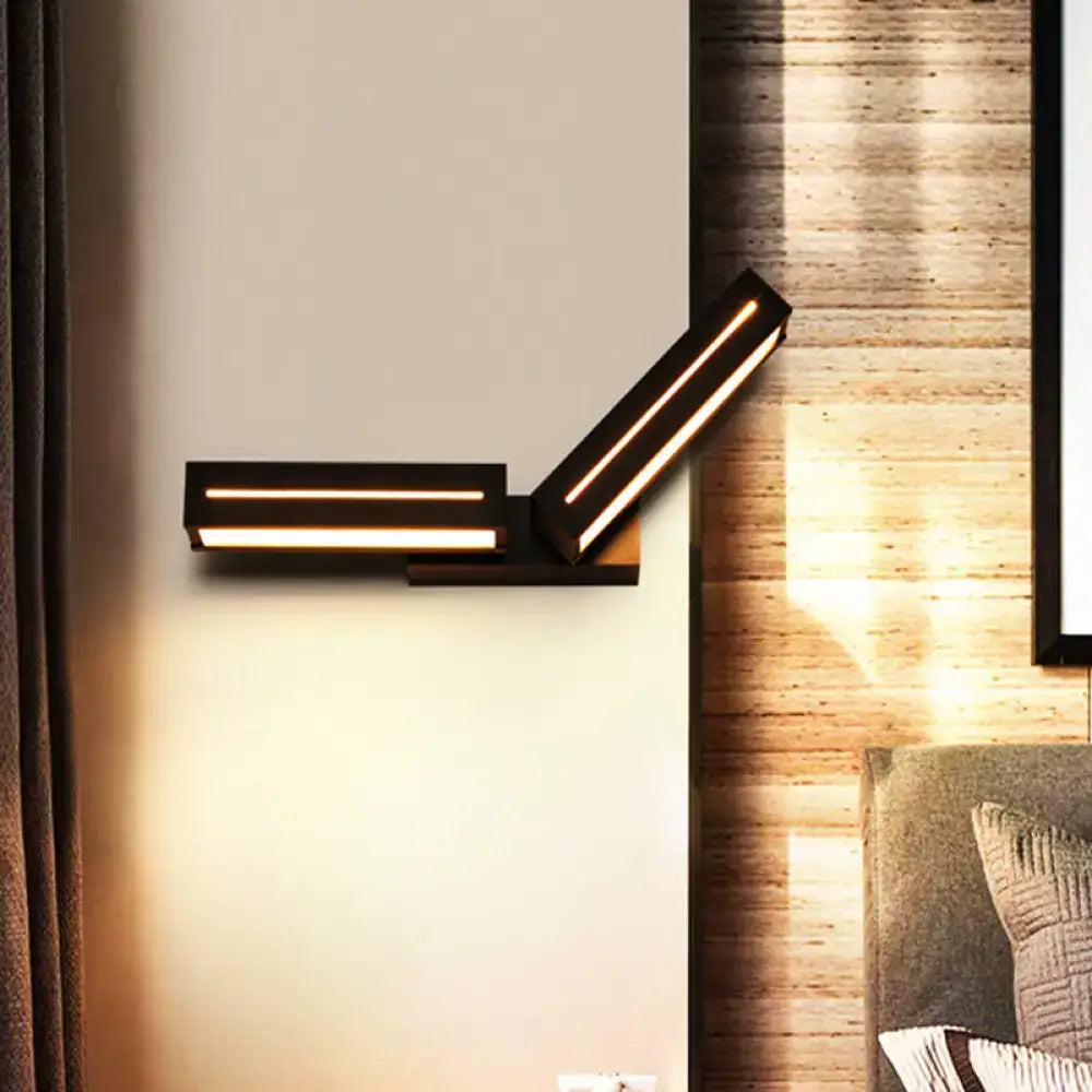 Silver acrylic wall sconce with angled rectangular bars, warm LED, Decorbites bedroom lighting on Tampa Home & Garden Store
