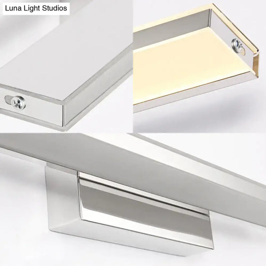 Silver slim LED sconce by Decorbites, chrome wall light with rectangular base and warm glow on Tampa Home & Garden Store