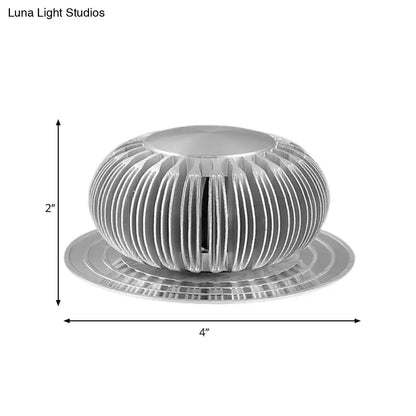 Silver Starburst Wall Sconce; silver metal orb with slotted spokes on round base on Tampa Home & Garden Store
