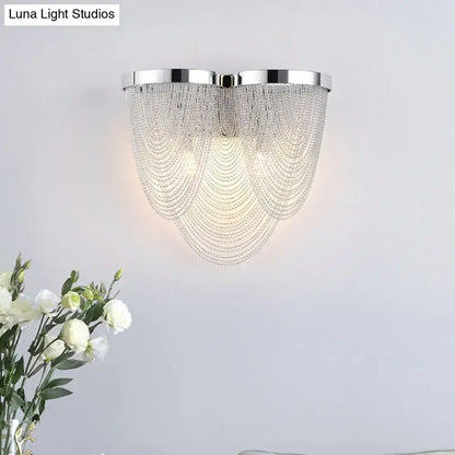 Silver tassel wall sconce with draped bead chains and chrome mount Decorbites on Tampa Home & Garden Store