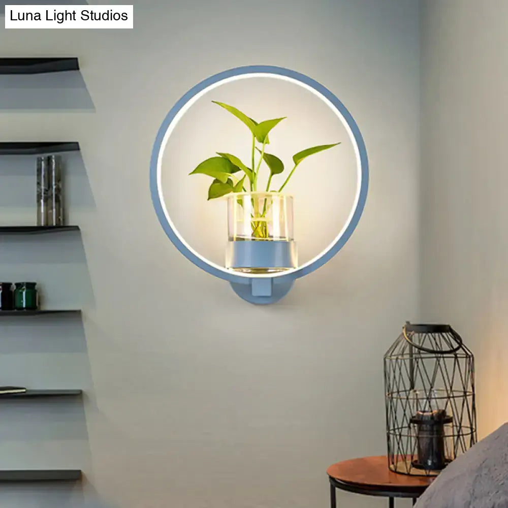 Modern silver wall light with plant pot LED sconce, round halo ring in bedroom decor on Tampa Home & Garden Store