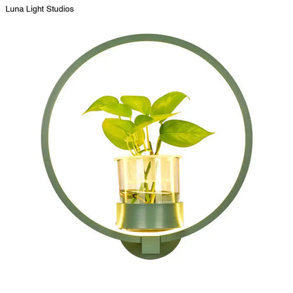 Modern circular silver wall light with glass plant pot and LED ring, bedroom sconce on Tampa Home & Garden Store