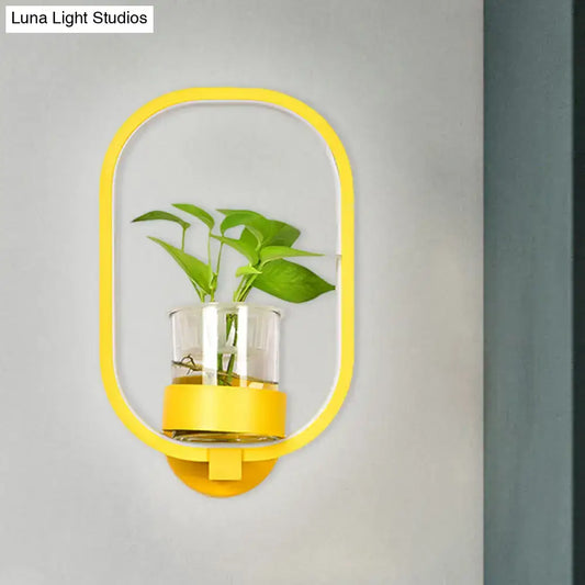 Yellow oval wall light with glass planter and green plant, modern bedroom sconce Decorbites on Tampa Home & Garden Store