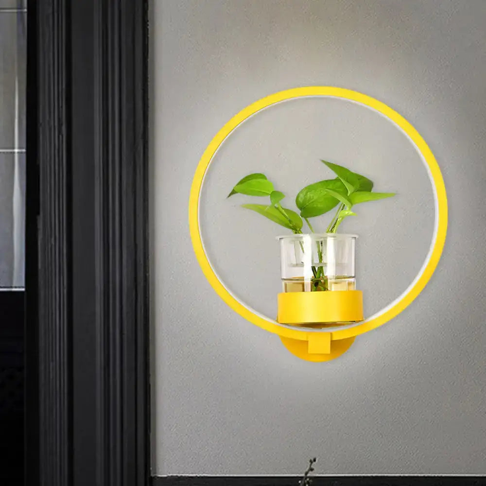 Modern silver wall light with plant pot and yellow circular ring LED sconce on Tampa Home & Garden Store