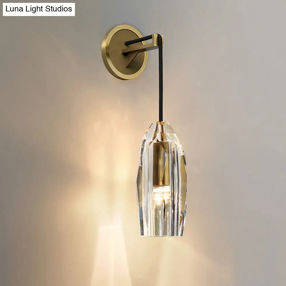 Decorbites brass crystal wall sconce with black arm and faceted glass shade on Tampa Home & Garden Store