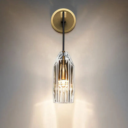 Brass crystal wall sconce Decorbites with clear shade and black cord, compact bedroom light on Tampa Home & Garden Store