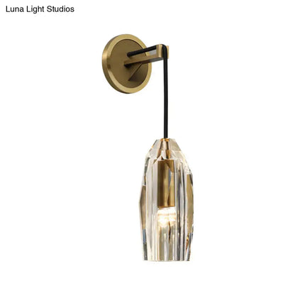 Brass crystal wall sconce with black arm and faceted shade for compact bedroom by Decorbites on Tampa Home & Garden Store
