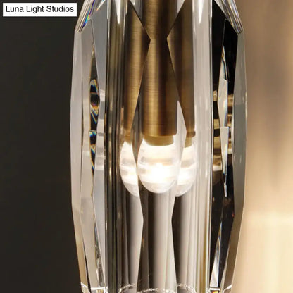 Brass crystal wall sconce with faceted glass prisms for a compact bedroom Decorbites on Tampa Home & Garden Store
