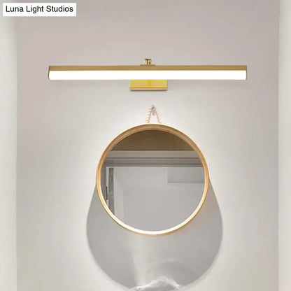 1 brass LED wall light above a round hanging mirror by Decorbites on Tampa Home & Garden Store