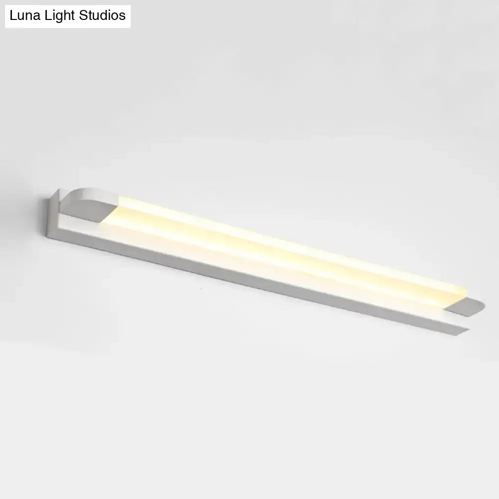 Slim modern LED bathroom vanity light in white metal with warm glow on Tampa Home & Garden Store