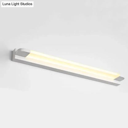 Slim modern LED bathroom vanity light in white metal with warm glow on Tampa Home & Garden Store