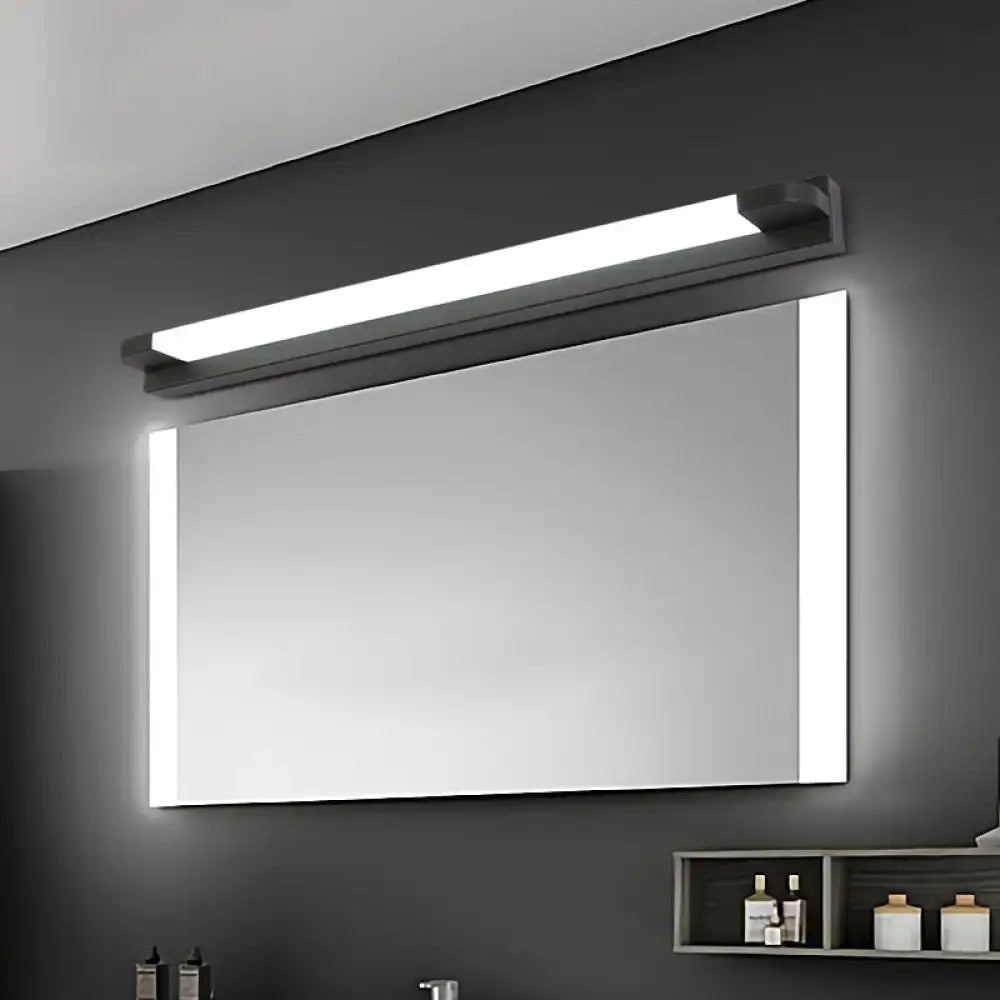 Decorbites slim LED bathroom vanity light with black frame and white glow above mirror on Tampa Home & Garden Store