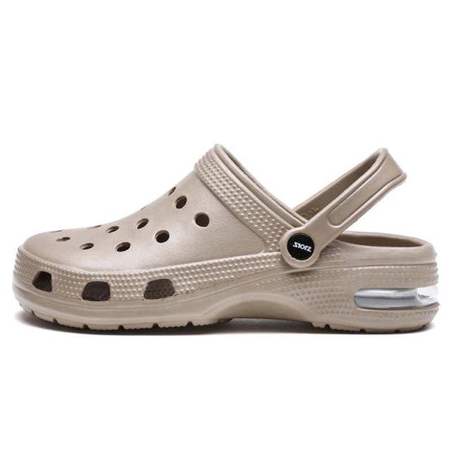 Stevvex unisex garden clogs with perforated beige upper, rear strap and cushioned sole on Tampa Home & Garden Store
