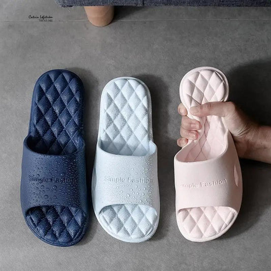 Set of 3 open-toe EVA slippers in navy, light blue, and blush pink with quilted footbeds on Tampa Home & Garden Store