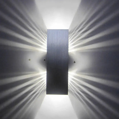 Aluminum LED Slotted Wall Sconce by Decorbites, silver metal finish, wall-mounted lighting on Tampa Home & Garden Store