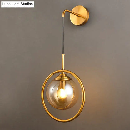 Gray glass globe sconce with brass ring Decorbites wall light fixture on Tampa Home & Garden Store