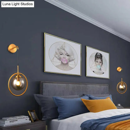 Gray Glass Globe Sconce pair with gold rings and smoky glass, Decorbites wall lights on Tampa Home & Garden Store