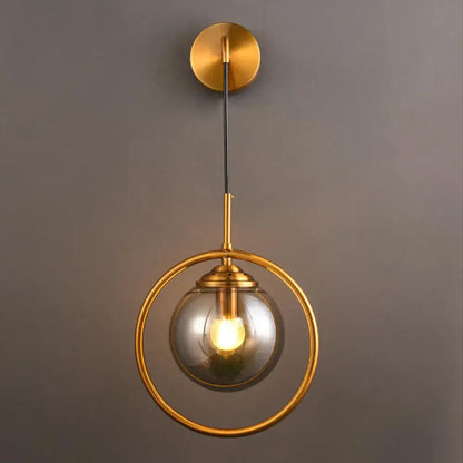 Gray Glass Globe Sconce by Decorbites, brass ring wall light with smoky glass globe on Tampa Home & Garden Store