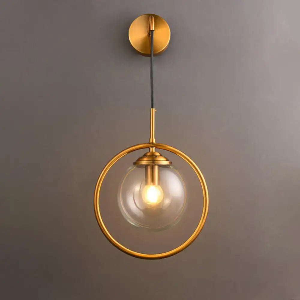 Gray Glass Globe Sconce by Decorbites; brass circular ring wall light fixture on Tampa Home & Garden Store
