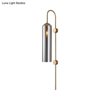 Gray glass cylindrical sconce with brass hardware wall mount by Decorbites on Tampa Home & Garden Store
