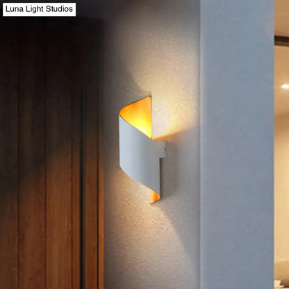 White Gold Spiral Sconce by Decorbites, modern wall light with warm amber glow on Tampa Home & Garden Store