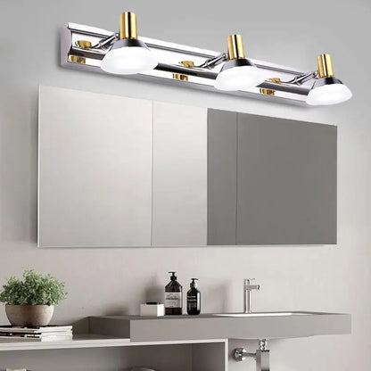Chrome Gold Vanity Light, 3-light bar with gold accents over gray bathroom vanity on Tampa Home & Garden Store