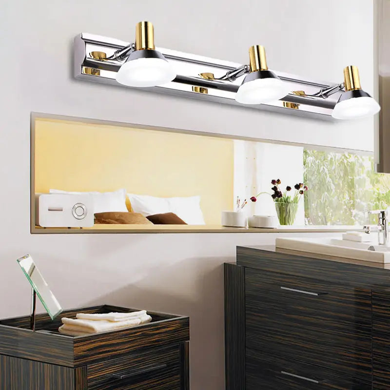 Chrome Gold vanity light fixture by Decorbites with three white glass shades on Tampa Home & Garden Store