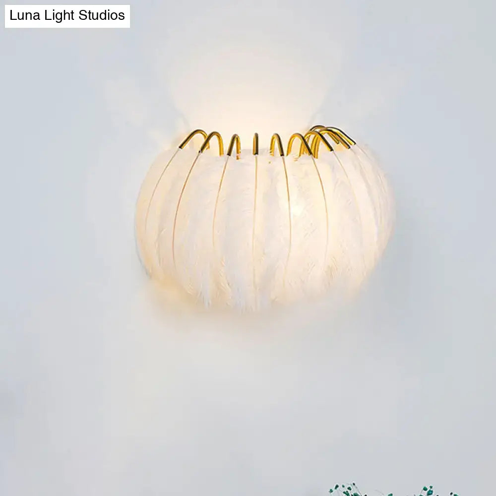 Grey Feather Parlor Wall Sconce with white feather orb and gold wire frame by Decorbites on Tampa Home & Garden Store