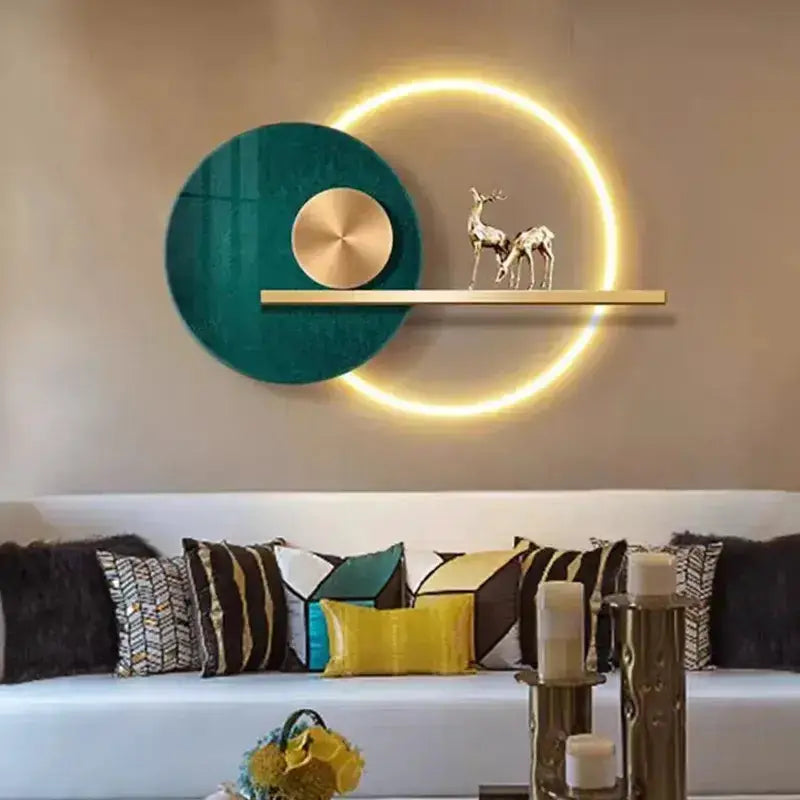 Teal & gold LED wall sconce with circular art, teal panel and gold halo, shelf with deer on Tampa Home & Garden Store