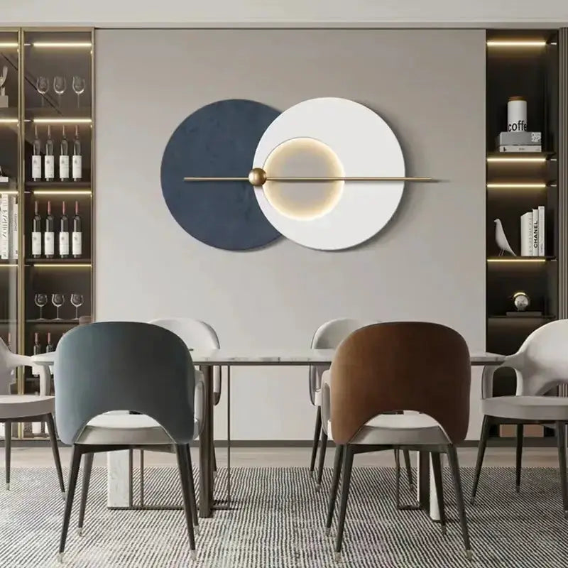 Modern teal and gold LED wall sconce with overlapping teal-white circular panels and brass rod on Tampa Home & Garden Store