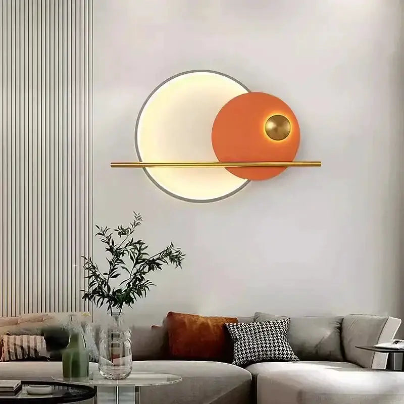 Modern teal and gold LED wall sconce with circular wall art, white ring and orange disk on Tampa Home & Garden Store