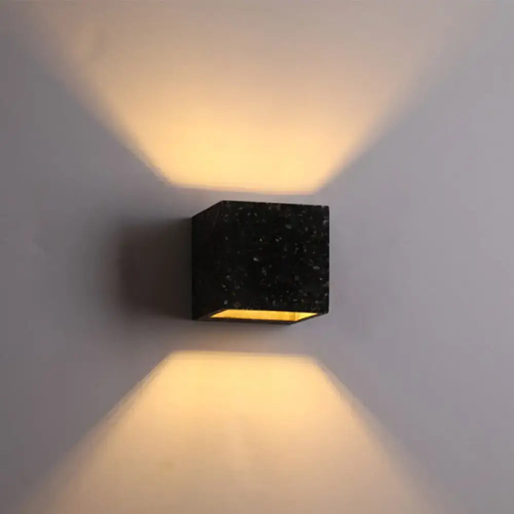 Decorbites Terrazzo Square Wall Sconce, black terrazzo cube wall light with warm glow on Tampa Home & Garden Store