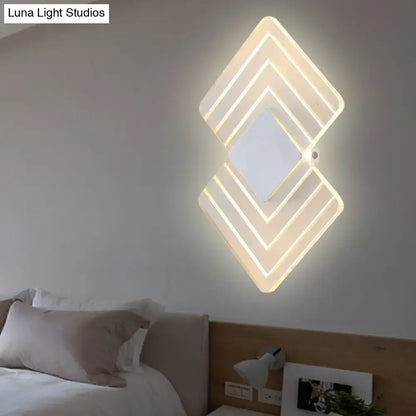 Silver Black LED Sconce with diamond-frame design and warm white LED glow by Decorbites on Tampa Home & Garden Store
