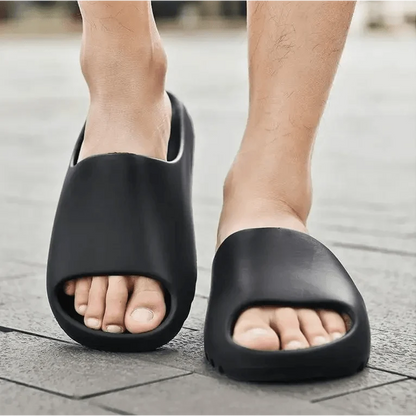 Slippers: black thick-soled unisex slide sandals for indoor outdoor use with non-slip grip on Tampa Home & Garden Store