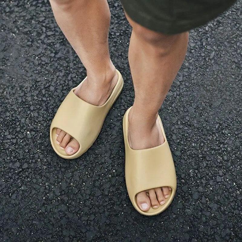 Beige thick-strap slide sandals, pair of unisex spa slippers for indoor outdoor use on Tampa Home & Garden Store