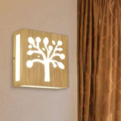 Decorbites bamboo tree-pattern wall light, wooden sconce with backlit tree cutout and glow on Tampa Home & Garden Store