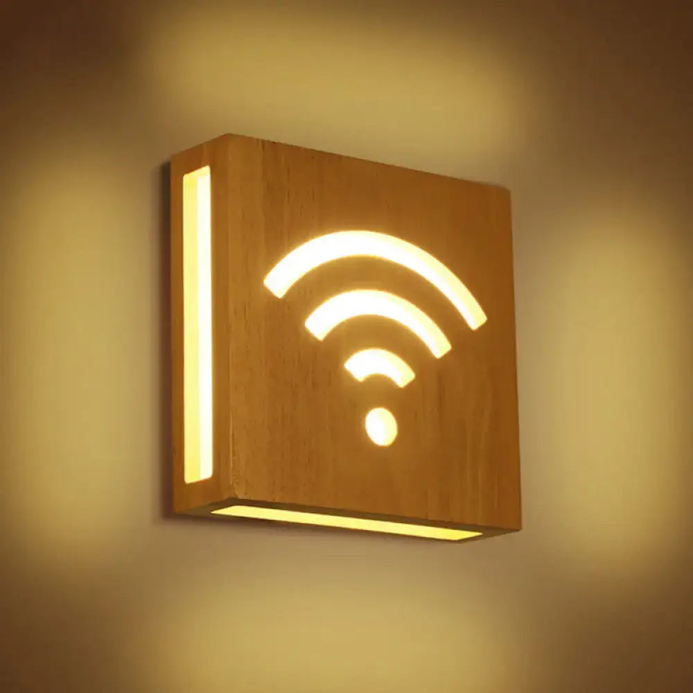 Wood Tree Wall Sconce by Decorbites; warm wood with glowing wifi-style arc cutouts on Tampa Home & Garden Store