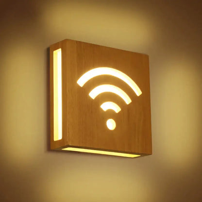 Wood Tree Wall Sconce by Decorbites; warm wood with glowing wifi-style arc cutouts on Tampa Home & Garden Store
