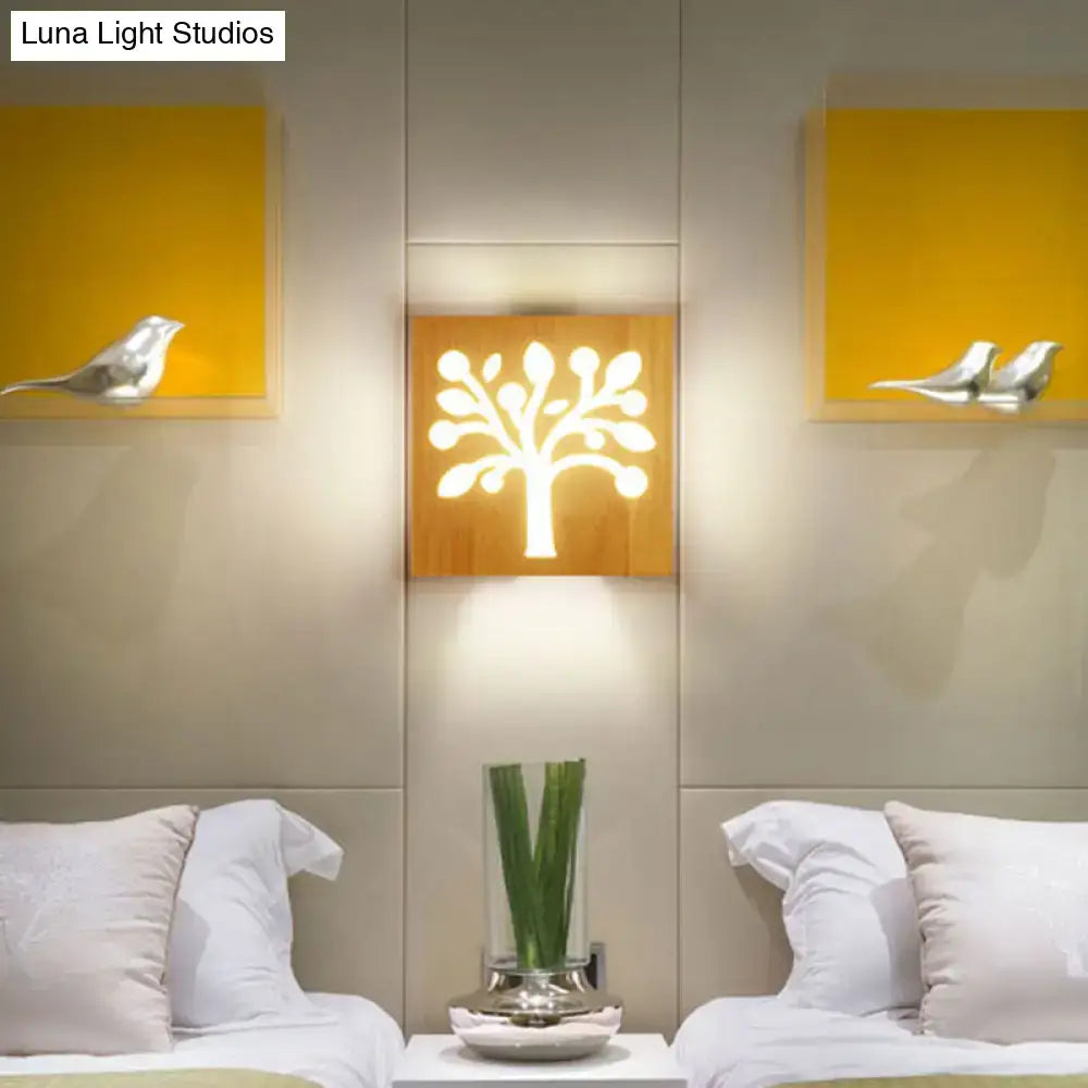 Wood Tree Silhouette Wall Sconce by Decorbites, warm wood finish with glowing white tree on Tampa Home & Garden Store