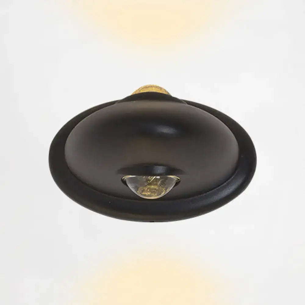 Wall sconce Decorbites round black metal flush mount with visible bulb on Tampa Home & Garden Store