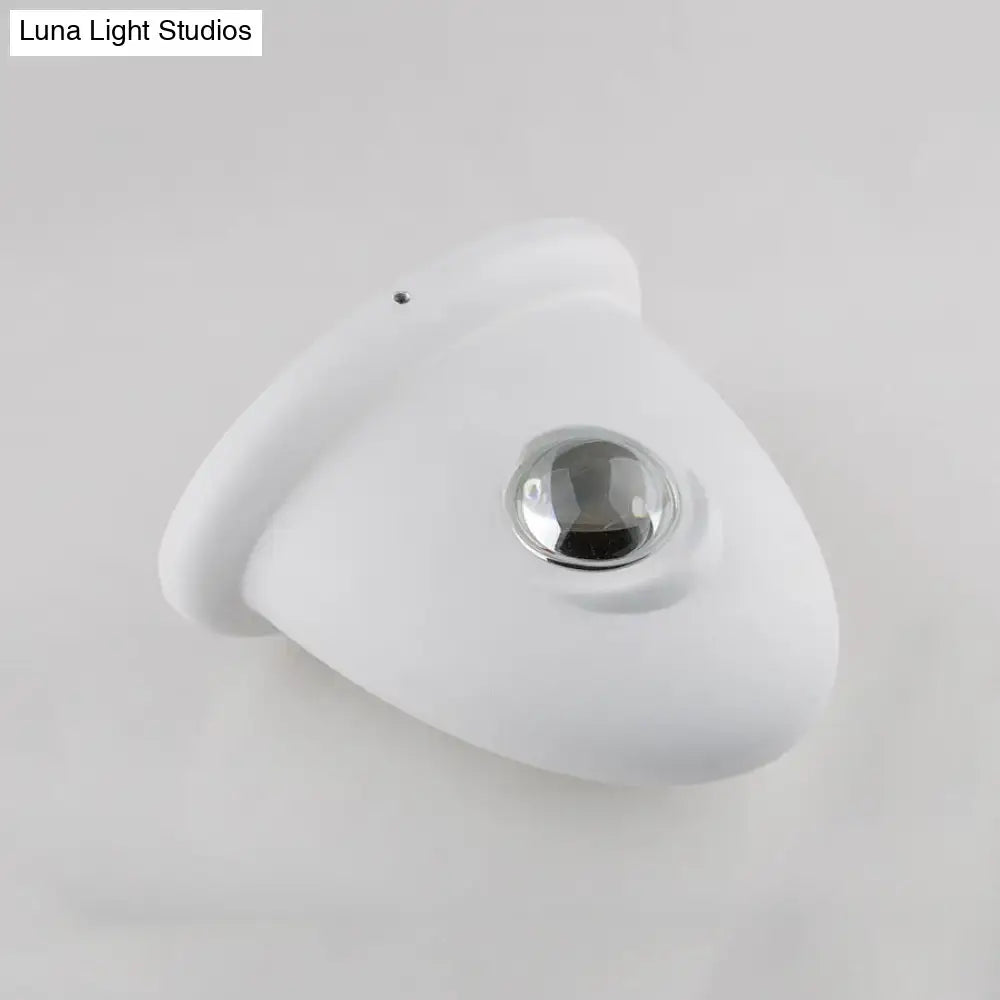 White chrome wall sconce with curved backplate and circular chrome spotlight by Decorbites on Tampa Home & Garden Store