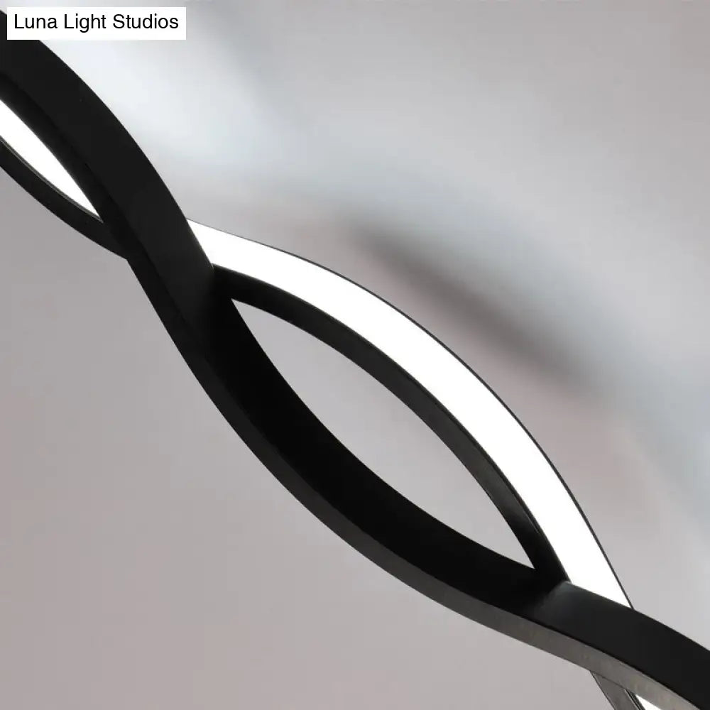 Black acrylic intertwined LED wall sconce with twin circular rings by Decorbites on Tampa Home & Garden Store
