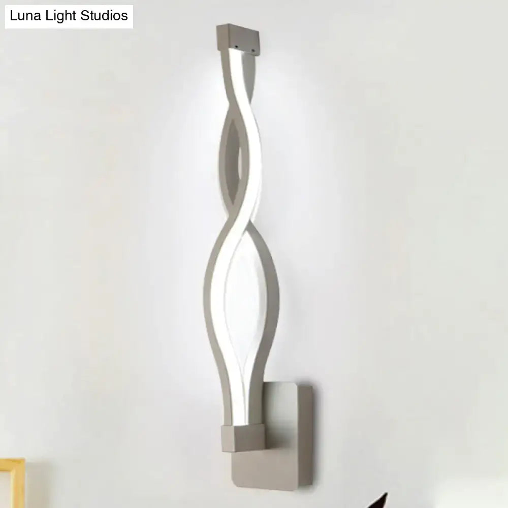 Black Acrylic Intertwined LED Wall Sconce by Decorbites, twisting ribbon silhouette on Tampa Home & Garden Store